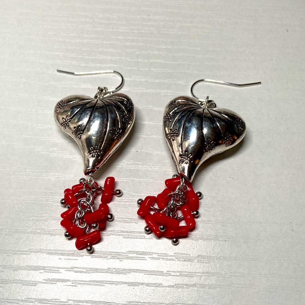 Handmade vintage German glass beaded with a puffy silver heart earrings.